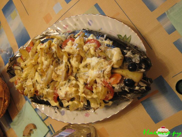 Кефаль запечённая с овощами