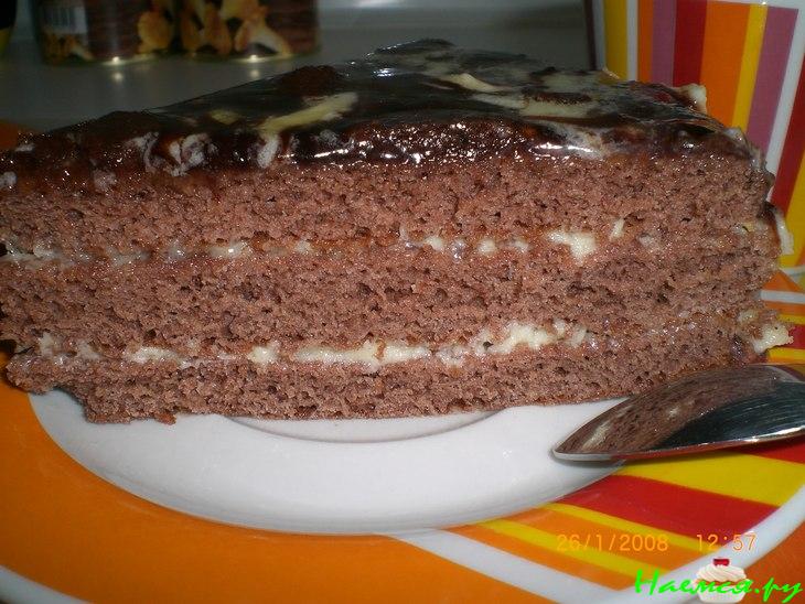 Торт 'Прага' со сливочным кремом в шоколадной глазури Торт 'Прага' со сливочным кремом в шоколадной глазури