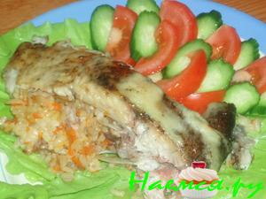 Лещ запеченный с начинкой из риса