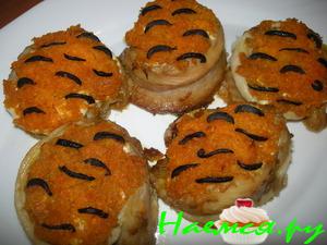 Рыбные рулетики с морковкой в сметане