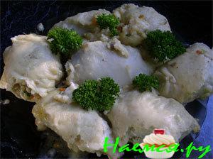 Фаршированные кальмары под соусом