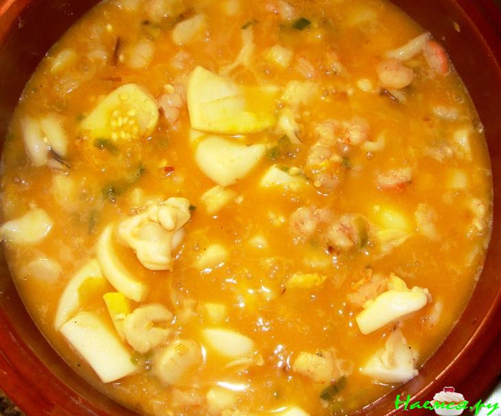 Рис с морскими гребешками и каракатицей