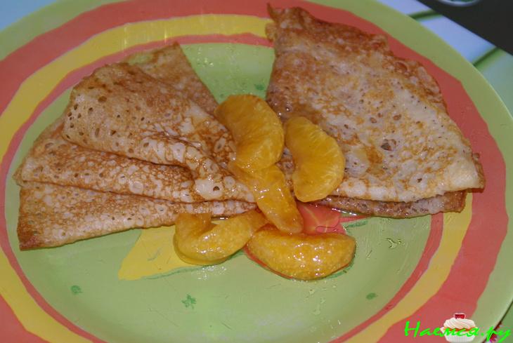 Блинчики на пиве с мандаринами в карамели