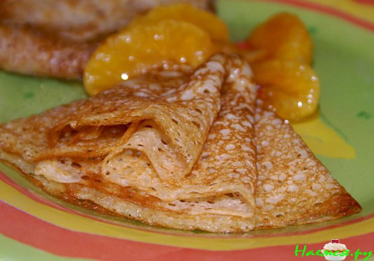 Блинчики на пиве с мандаринами в карамели