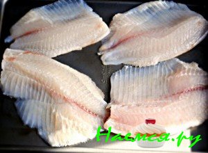 Помойте тилапию - фото